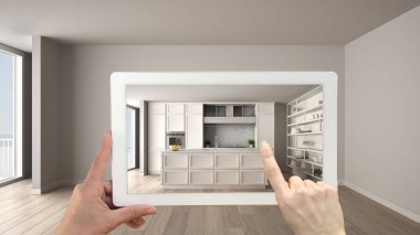 Artırılmış gerçeklik kavramı. El tutma tablet ile parke zemin, klasik beyaz mutfak ile boş iç mobilya ve tasarım ürünleri benzetimini yapmak için kullanılan Ar uygulama