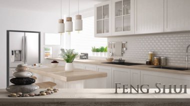 İskandinav beyaz ve ahşap modern mutfak, zen konsept iç tasarım ahşap antika tablo raf çakıl dengesi ve kelime feng shui yapım 3d harfler ile bulanık