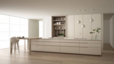 Bulanıklık arka plan iç tasarım, çevre dostu daire beyaz minimalist mutfak, ada, masa, tabureler ve aksesuarları ile açık dolap, pencere, bambu, hidroponik vazolar, parke