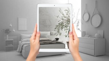 Modern minimalist yatak odası gösteren eller tutma tablet, toplam boş proje arka plan, artırılmış gerçeklik konsepti, mobilya ve iç tasarım ürünleri simüle etmek için uygulama