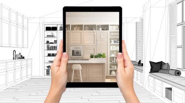Modern beyaz ve ahşap mutfak gösteren tablet tutan eller. Blueprint Cad skeç arka plan, artırılmış gerçeklik kavramı, uygulama mobilya ve iç tasarım ürünleri simüle etmek