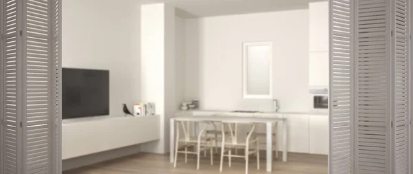 Białe drzwi składane otwierające się na minimalistyczną białą kuchnię ze stołem i parkietem, zlewozmywakiem i kuchenką gazową, biały wystrój wnętrz, koncepcja projektanta, rozmyte tło — Zdjęcie stockowe