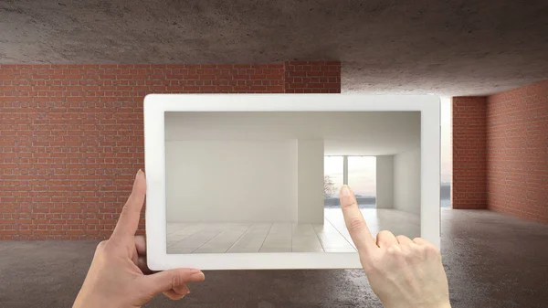 Концепция дополненной реальности. Ручной планшет с приложением AR для имитации мебели и дизайнерских изделий на строительной площадке интерьера, пустой интерьер с паркетным полом — стоковое фото