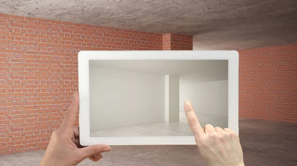 Augmented reality concept. Hand holding tablet with AR application used to simulate furniture and design products in an interior construction site, empty interior with parquet floor — Stock Photo, Image