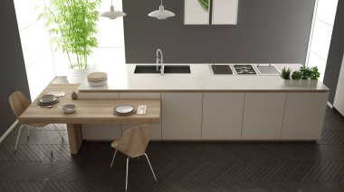 Modern temiz çağdaş beyaz mutfak, sandalye, bambu ve saksı bitkileri, büyük pencere ve ringa kemiği parke zemin, iç tasarım, üst görünümü ile ahşap yemek masası