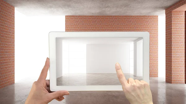 Augmented reality concept. Hand holding tablet with AR application used to simulate furniture and design products in an interior construction site, empty interior with parquet floor — Stock Photo, Image