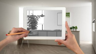 Holding ve tablet gösteren modern beyaz mutfak ahşap detayları Cad çizim el kroki. Gerçek bitmiş iç mimari tasarım sunum arka planda