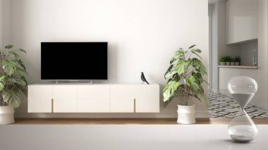 Minimalist beyaz oturma odası, mimari iç tasarım, kopya alan arka plan üzerinde geçen süreyi ölçen kristal kum saati ile beyaz masa veya raf