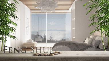 Wooden vintage table shelf with pebble and 3d letters making the word feng shui over blurred minimalist bedroom with double bed,shower and panoramic window, zen concept interior design clipart