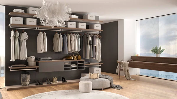 Dormitorio moderno de lujo blanco y gris con vestidor con ropa, decoración, suelo de parquet, ventana panorámica con panorama de invierno, alfombra, puf, diseño de interiores de arquitectura minimalista — Foto de Stock