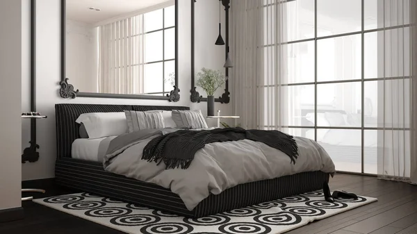 Сучасна біло-сіра спальня в класичній кімнаті з настінними молдингами, паркетом, двоспальним ліжком з ковдрою і подушками, мінімалістичними тумбочками, дзеркалом і декорами. Концепція дизайну інтер'єру — стокове фото