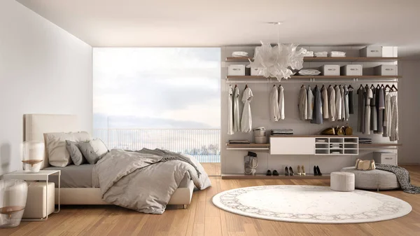Πολυτελές λευκό μοντέρνο υπνοδωμάτιο με διπλό κρεβάτι και δωμάτιο-ντουλάπα με ρούχα, παρκέ δάπεδο, πανοραμικό παράθυρο με χειμωνιάτικο Πανόραμα, χαλί, pouf, ελάχιστη αρχιτεκτονική εσωτερική διακόσμηση — Φωτογραφία Αρχείου
