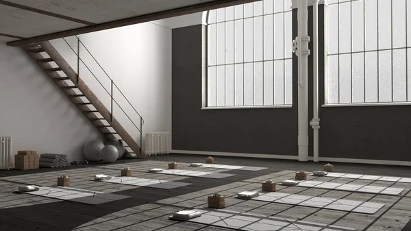 Empty yoga studio interior design, minimal industrial open space with iron staircase, mats and accessories, parquet floor and mezzanine, ready for yoga practice, panoramic windows