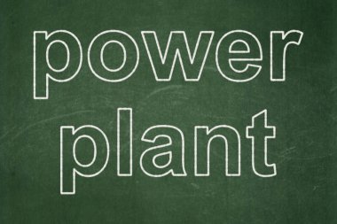 Endüstri kavramı: santral kara tahta arka plan üzerinde