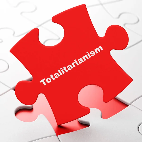 Politiek concept: totalitarisme op puzzel achtergrond — Stockfoto