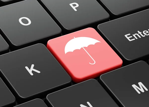 Sicherheitskonzept: Regenschirm auf Computertastatur — Stockfoto