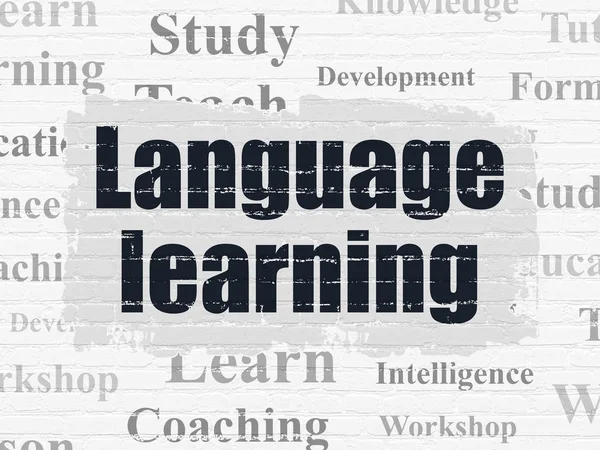 แนวคิดการศึกษา: การเรียนรู้ภาษาบนพื้นหลังผนัง — ภาพถ่ายสต็อก