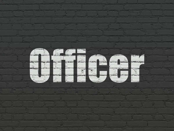 Law concept: Officer on wall background