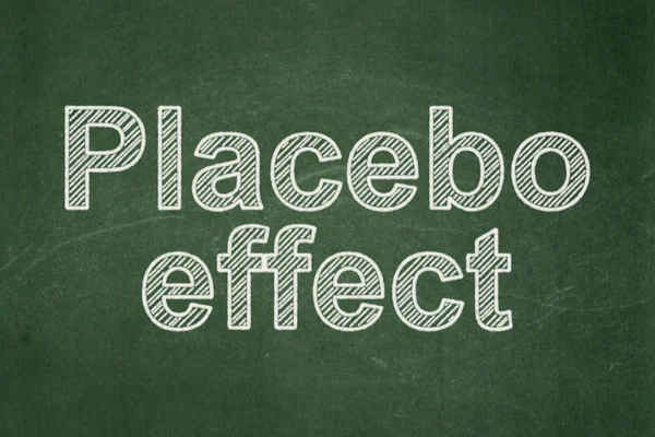 Gyógyszer fogalma: Placebo hatás a Palatábla háttér — Stock Fotó