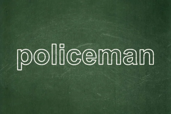 法の概念: 黒板背景に警官 — ストック写真