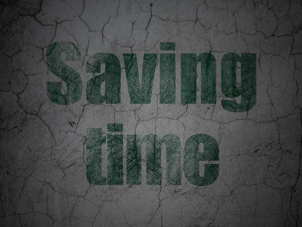 Pojęcie czasu: oszczędność czasu na tle ściany grunge — Zdjęcie stockowe