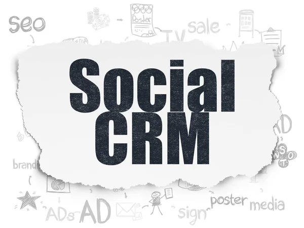 Conceito de publicidade: CRM social em fundo de papel rasgado — Fotografia de Stock