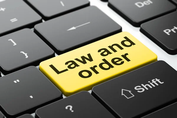 Concepto de ley: Ley y orden en el fondo del teclado del ordenador — Foto de Stock