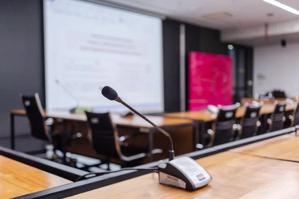 Microphone over the blurred business forum or Conference Training Learning Room Concept, Blurred background