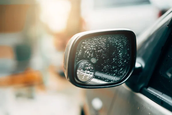 Road Car Rear View Mirror or Side Mirror Car after rain, Motion Blur Background (Vintage Style)