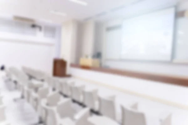 Blurred background of the conference room or seminar meeting room.