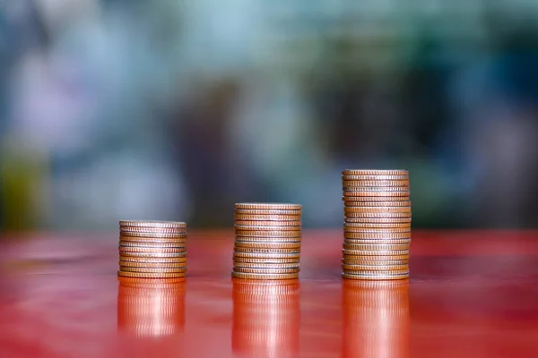 step of coins stacks, money, saving and investment or family planning concept.