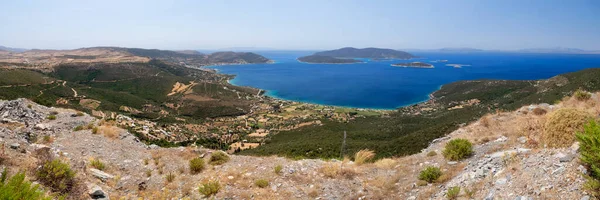 Panoramic view of the Aegean sea and the Greek village near the town of Marmari on the Greek island of Evia in Greece on a Sunny day