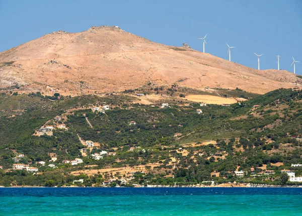 View of  Aegean sea, wind turbine near the town of Marmari on the Greek island of Evia in Greece on a Sunny day