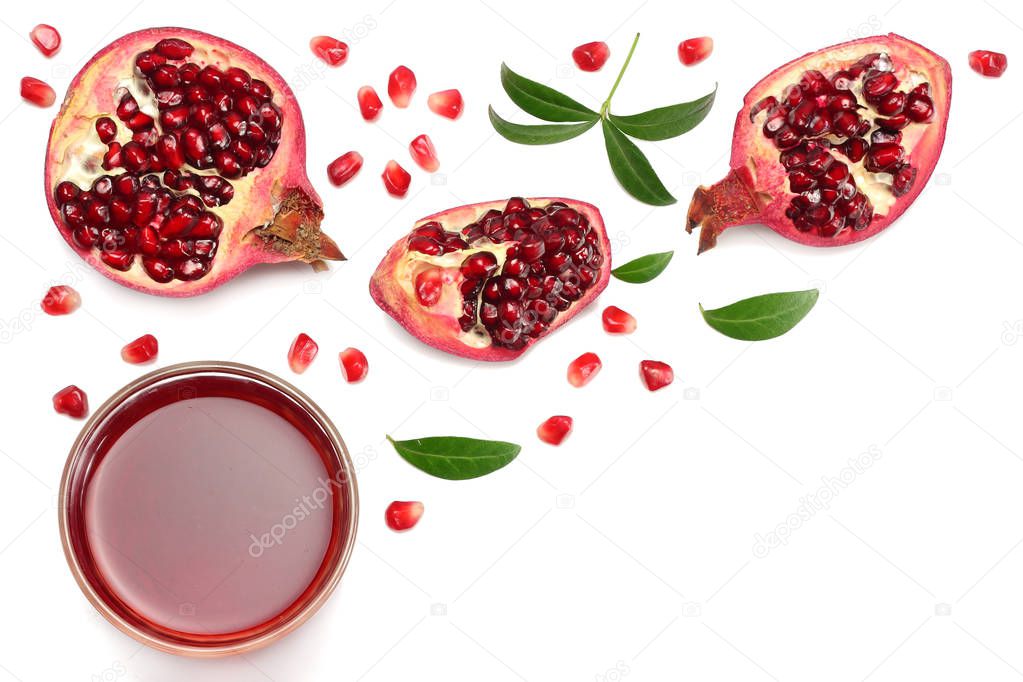 Pomegranate juice with pomegranate isolated on a white background top view
