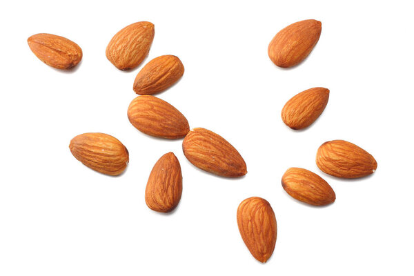 almonds isolated on white background top view