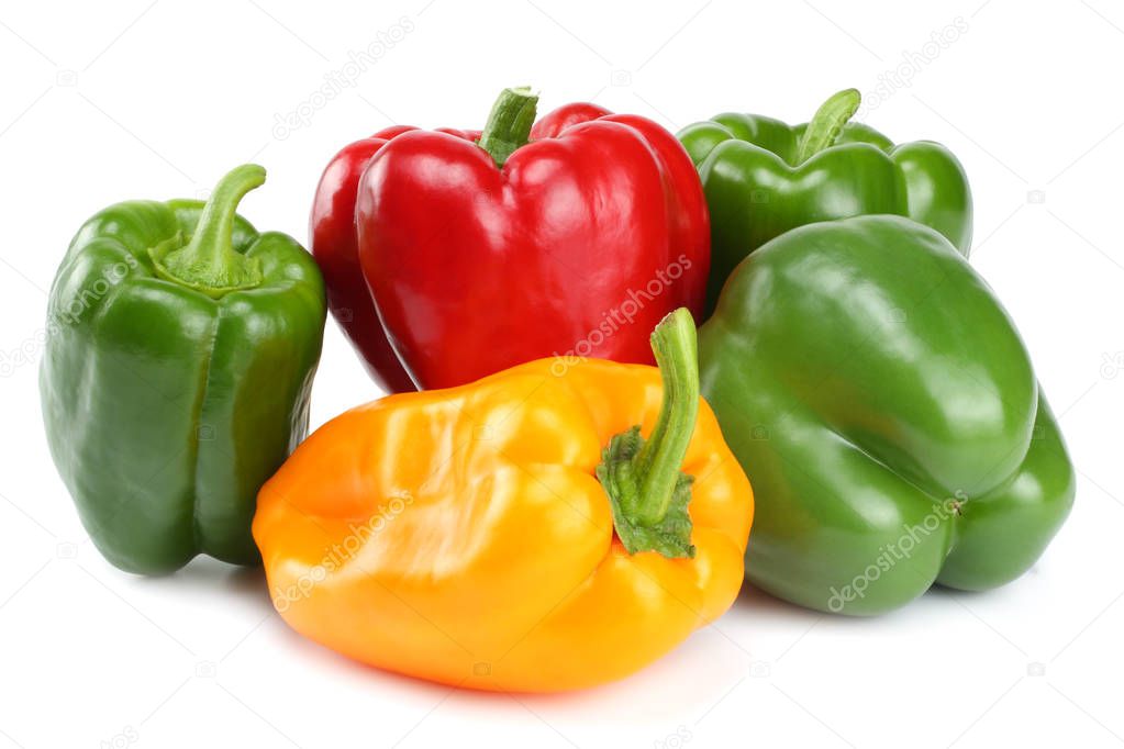 green, red, yellow sweet bell peppers isolated on white background