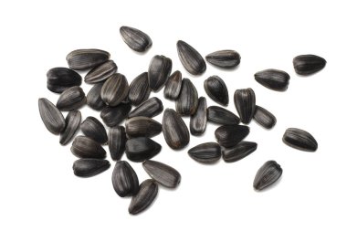 Beyaz arka planda izole edilmiş ayçiçeği tohumları. Üst görünüm