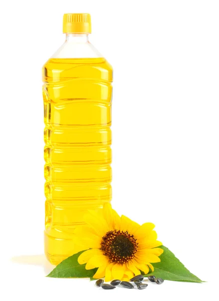 Solrosolja Plastflaska Frön Och Blomma Isolerad Vit Bakgrund — Stockfoto