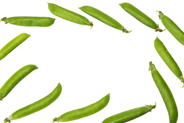 鲜绿色的豌豆在白色的背景上被隔离 顶部视图 — 图库照片