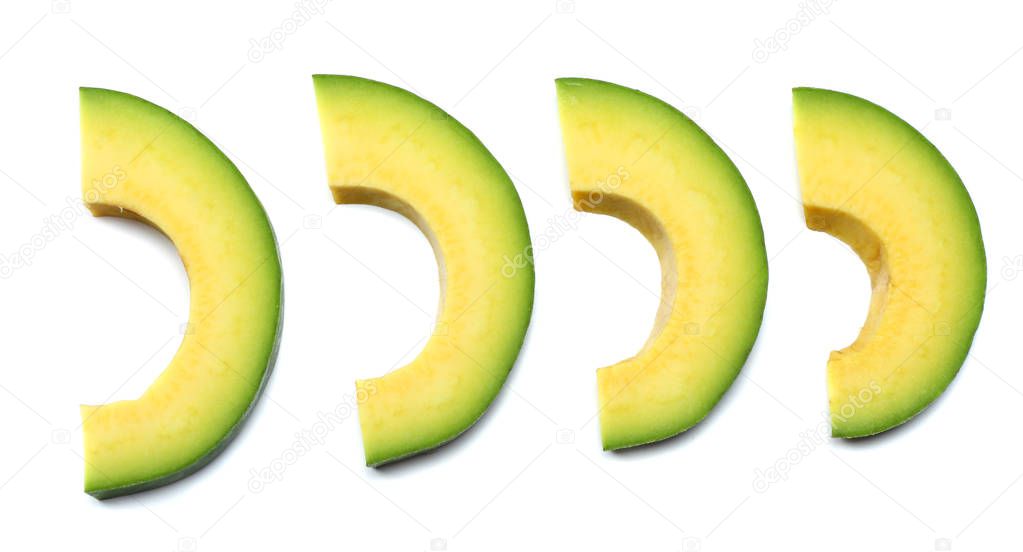 healthy food. sliced avocado isolated on white background. top view