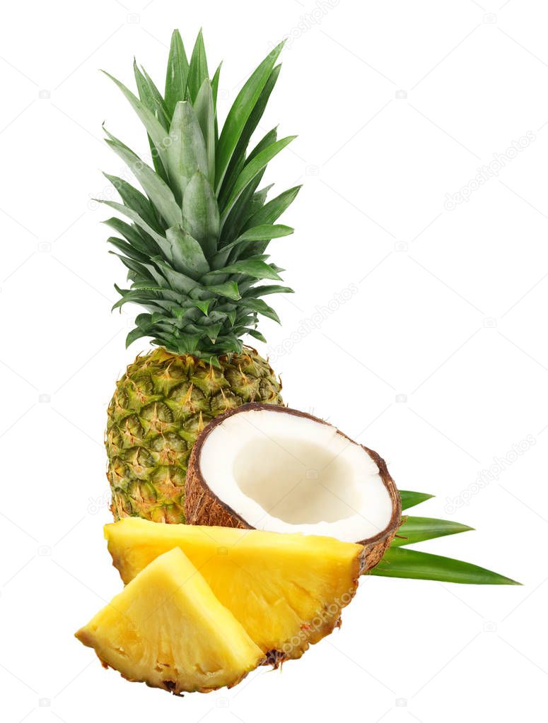 Coconut with pineapple and green leaves isolated on white background