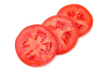 Beyaz arka plan üzerinde izole domates dilim. üstten görünüm