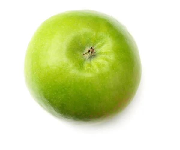 Uma maçã verde isolada sobre fundo branco. vista superior — Fotografia de Stock