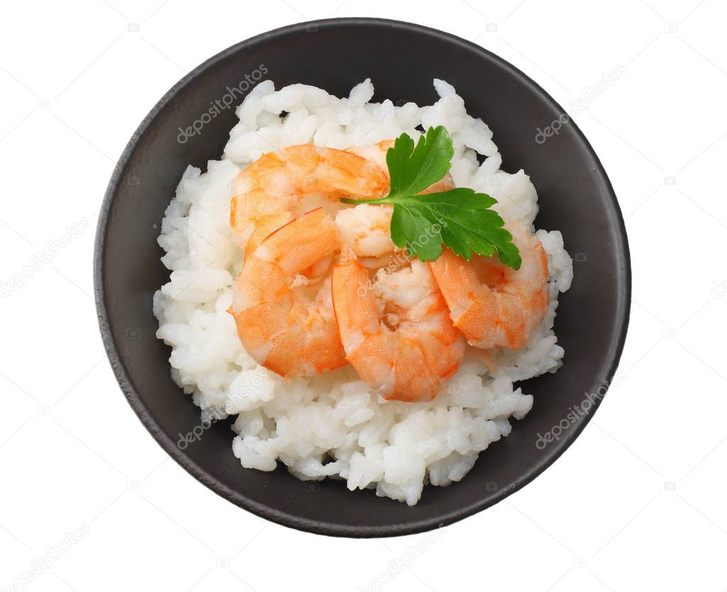 White rice with shrimps in black bowl isolated on white background. top view