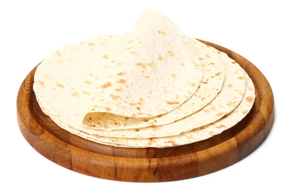 Tortilla wrap on wooden board isolated on white background — Stock Photo, Image