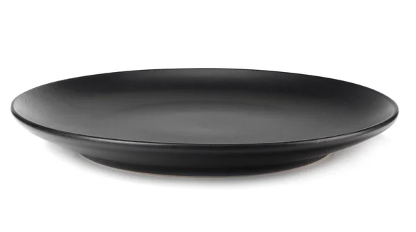 Leere schwarze runde Platte isoliert auf weißem Hintergrund — Stockfoto