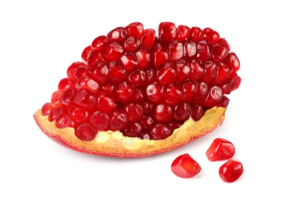 Piece of pomegranate with seeds isolated on a white background — Stock Photo, Image