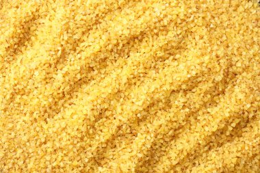 bulgur buğday arka planı. bulgur buğday dokusu. en üstteki görünüm 