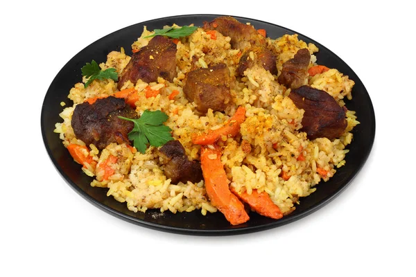 Pilaf con carne sobre plato negro aislado sobre fondo blanco —  Fotos de Stock