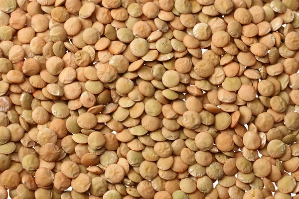 Pile lentils background. Pile lentils texture. Top view.